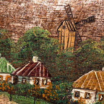 Landscape of the village with a church and a windmill