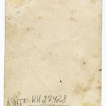 Two women and a man with wedding decor