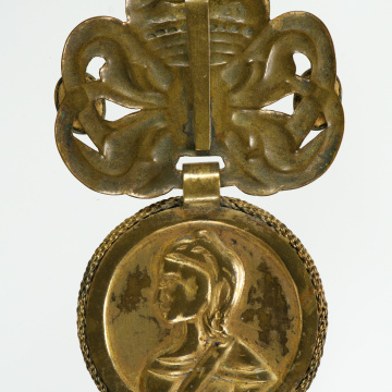 Large dukach (coin-shaped pendants) hung on a ribbon; worn as accessory