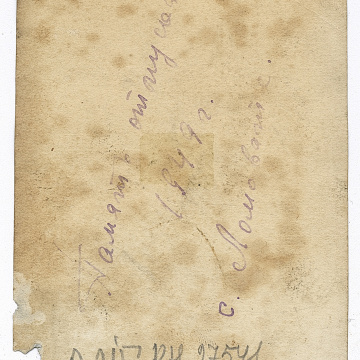 Girl in an embroidered shirt and man in a naval cadet uniform