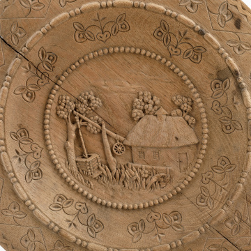 Carved wooden plate
