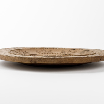 Carved wooden plate