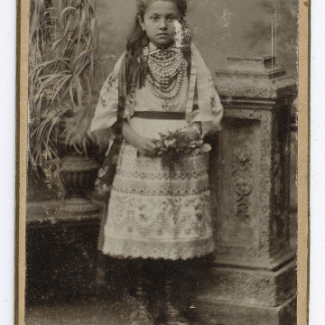 Girl in stylized traditional clothing