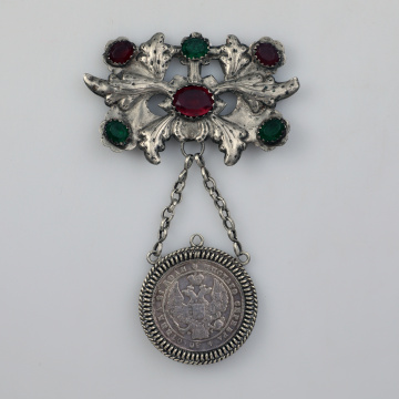 Large dukach (coin-shaped pendants) hung on a ribbon; worn as accessory