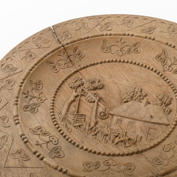 Carved wooden plate