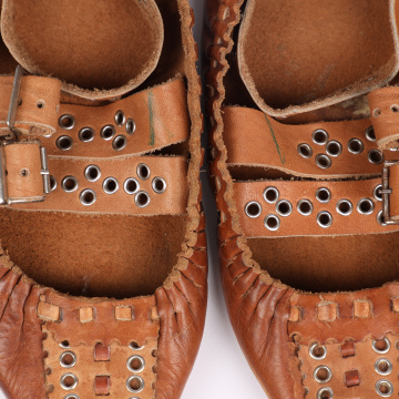 Postoly (women's boots) decorated with tin rings - kapsli