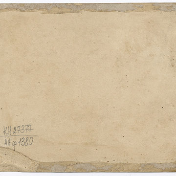 Man holding a child, woman, two boys, and a dog