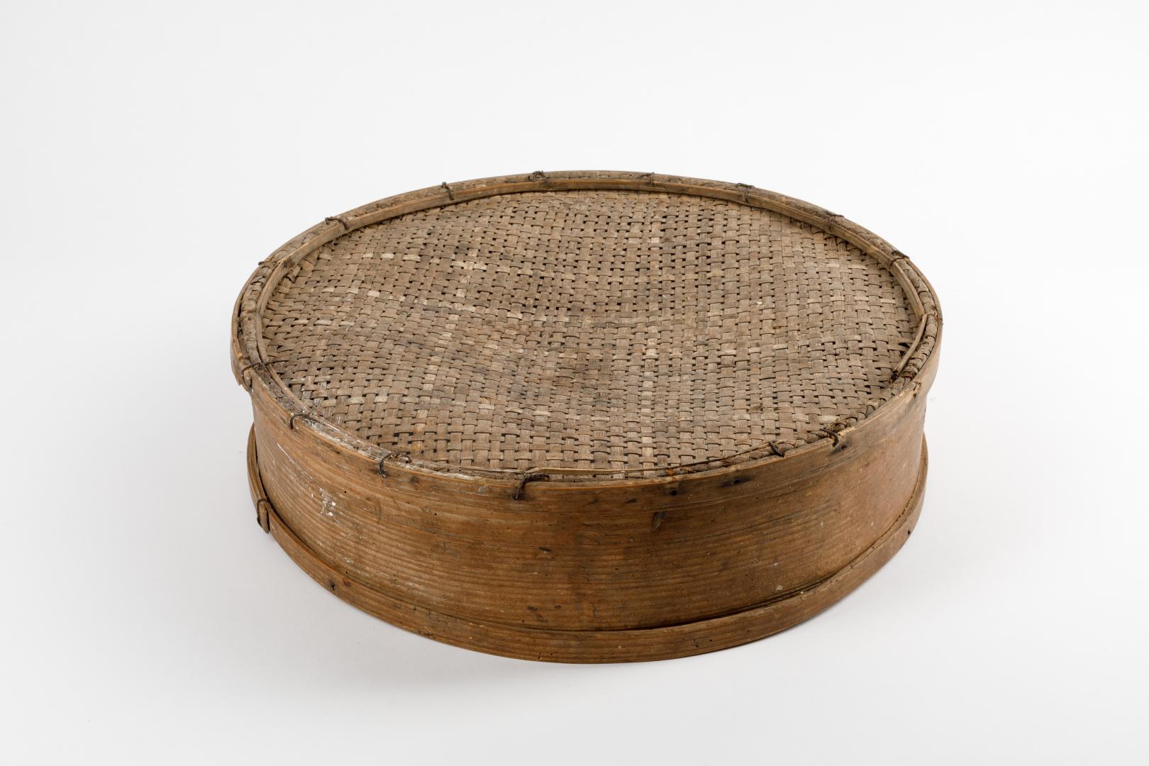 Small sieve typically with a handle