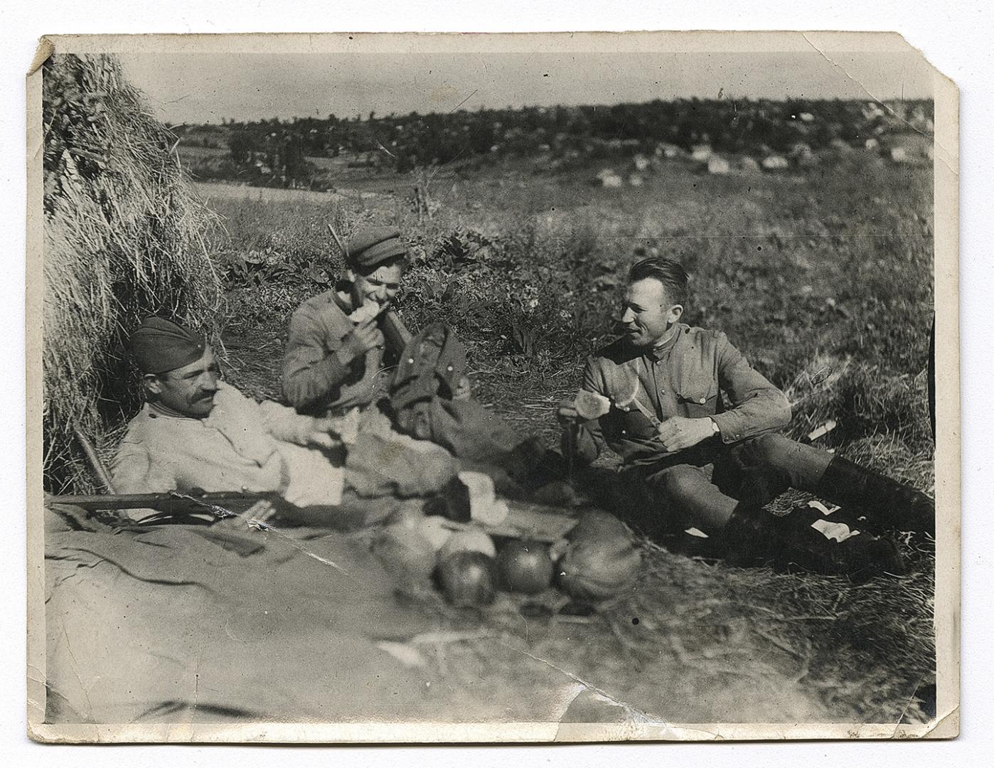 Three men in military uniform