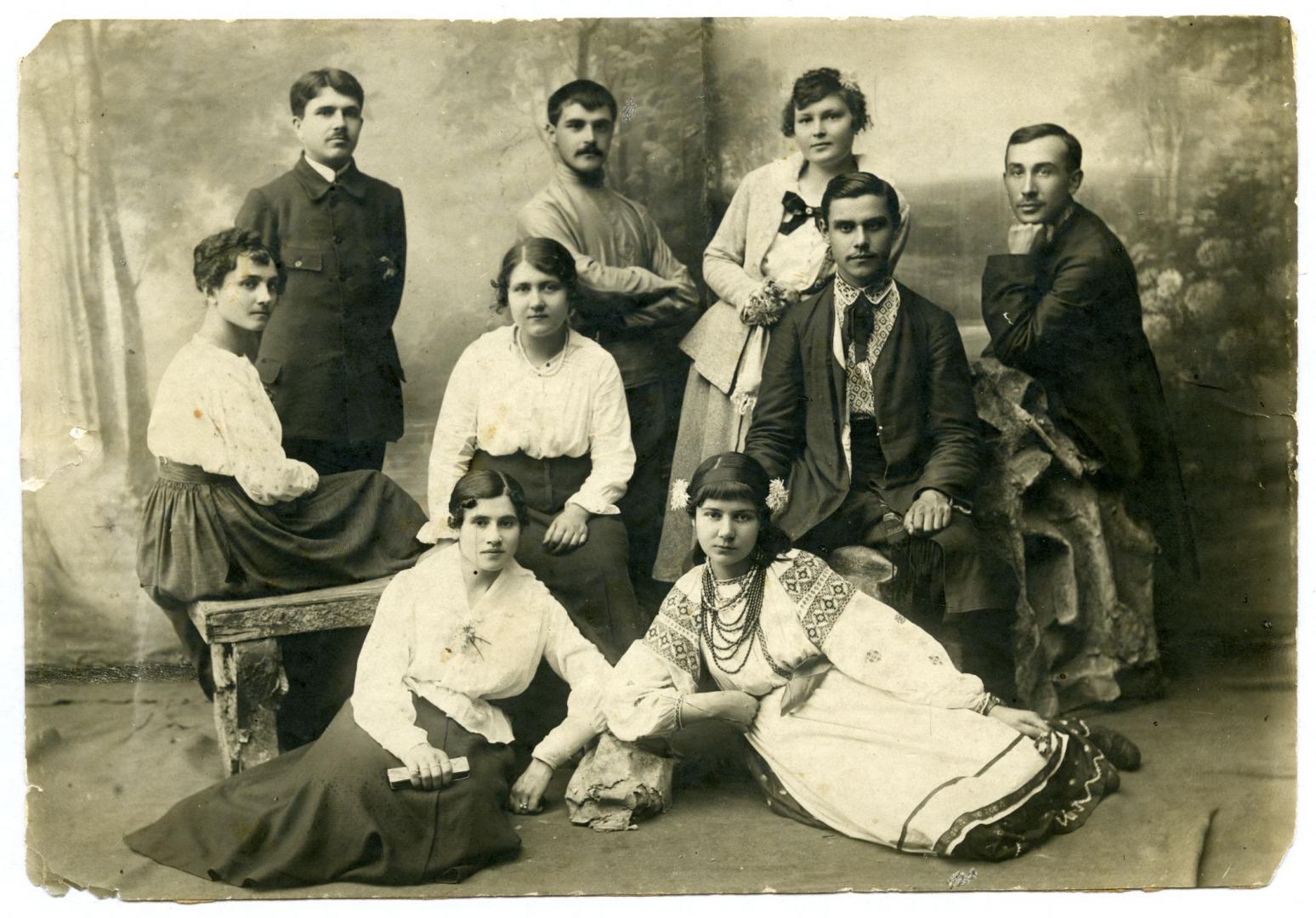 Photo. A group of young people wearing folk and urban upper-middle class attire