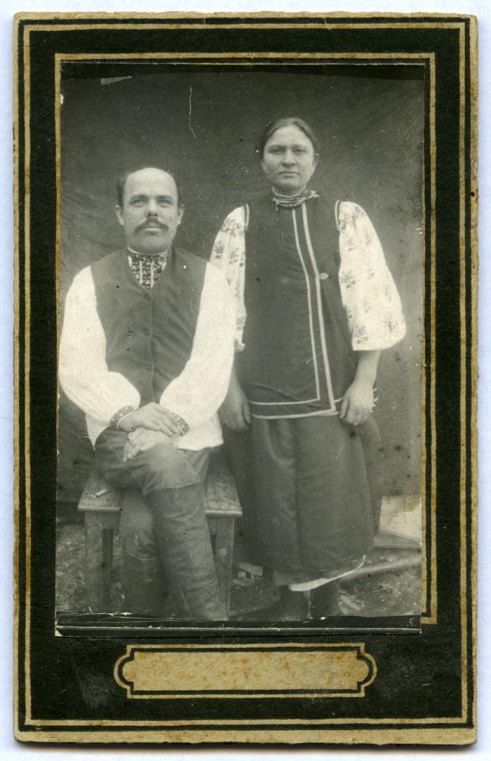 Photo. A married couple wearing folk attire