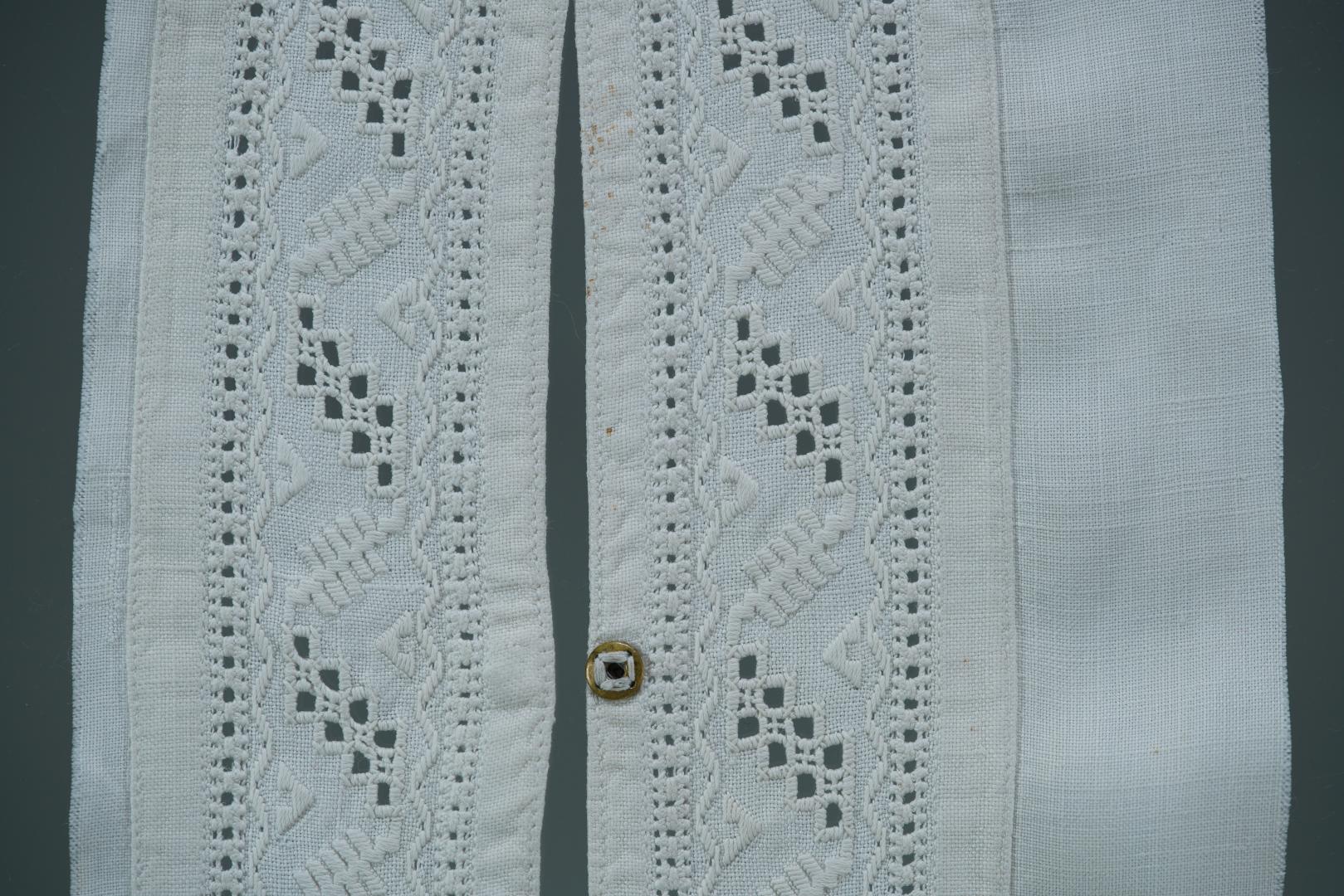 Fragment of an embroidered shirt