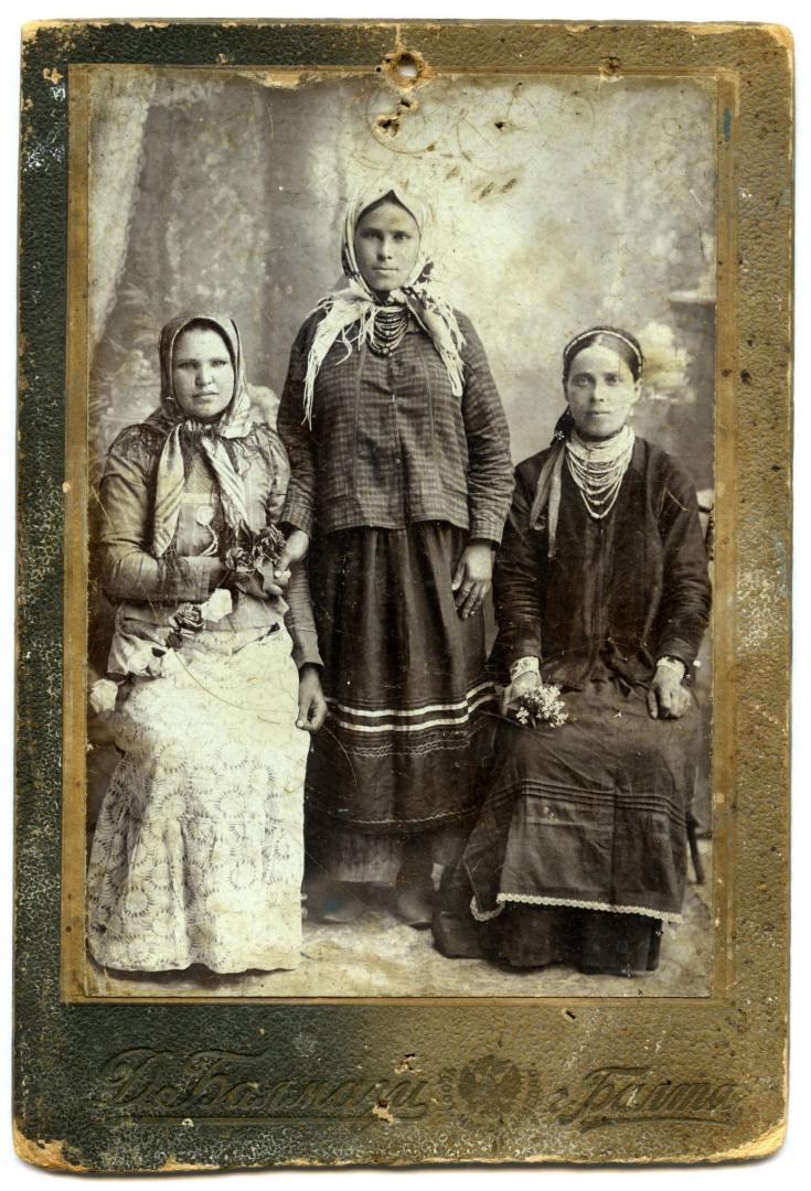 Photo. Women and girl wearing folk attire