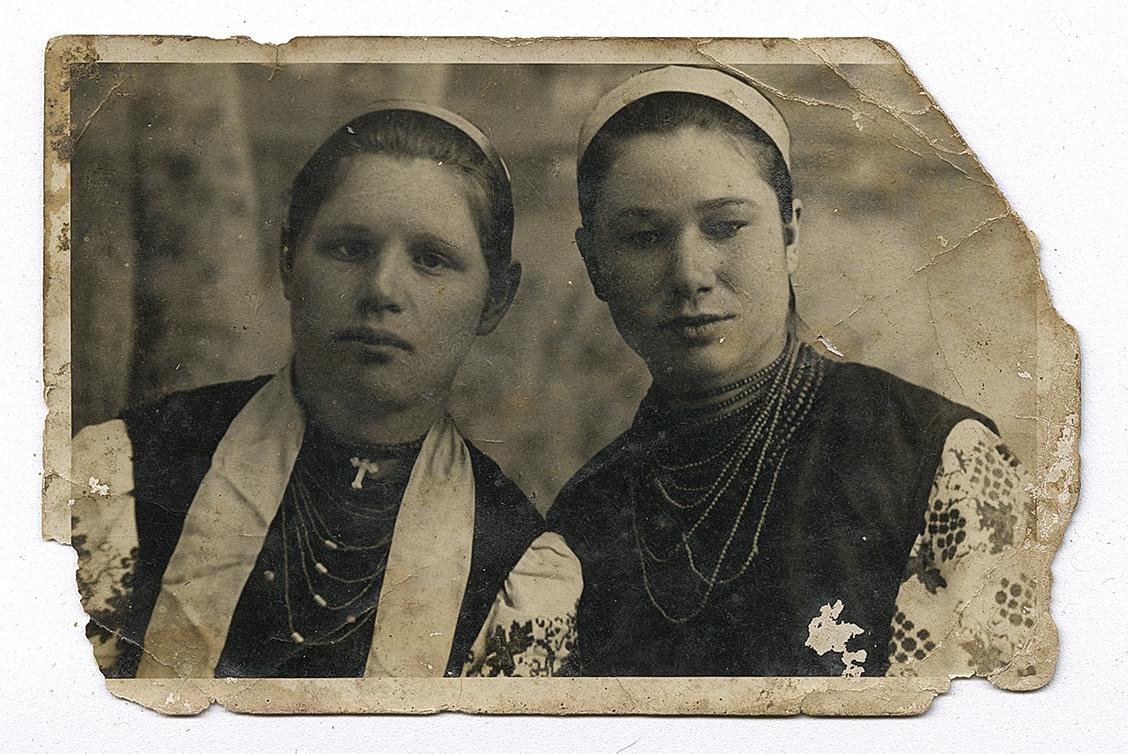 Bust portrait of two girls in traditional attire