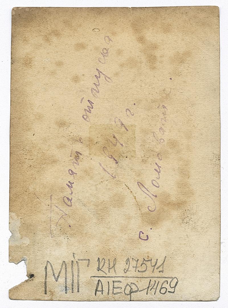 Girl in an embroidered shirt and man in a naval cadet uniform