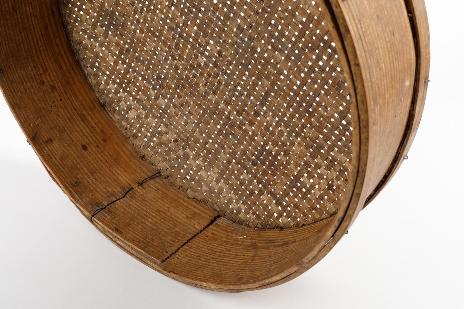 Small sieve typically with a handle