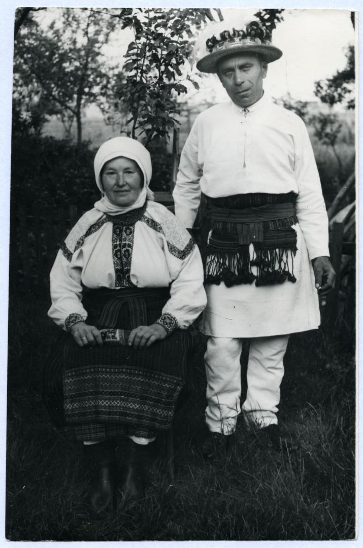 Photo. A man and a woman wearing folk attire
