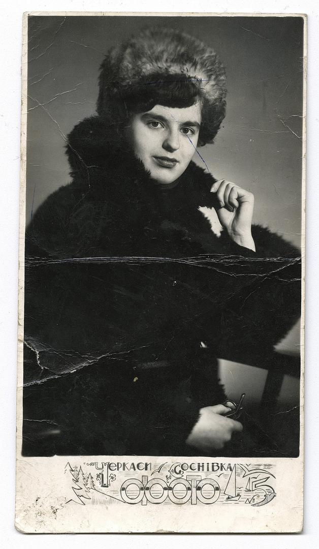 Girl in a fur coat and fur hat