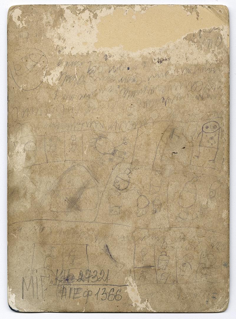 Woman in traditional attire with a man and three children