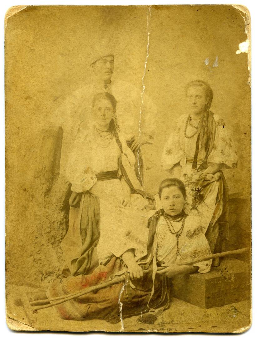 Photo. A young man and three girls