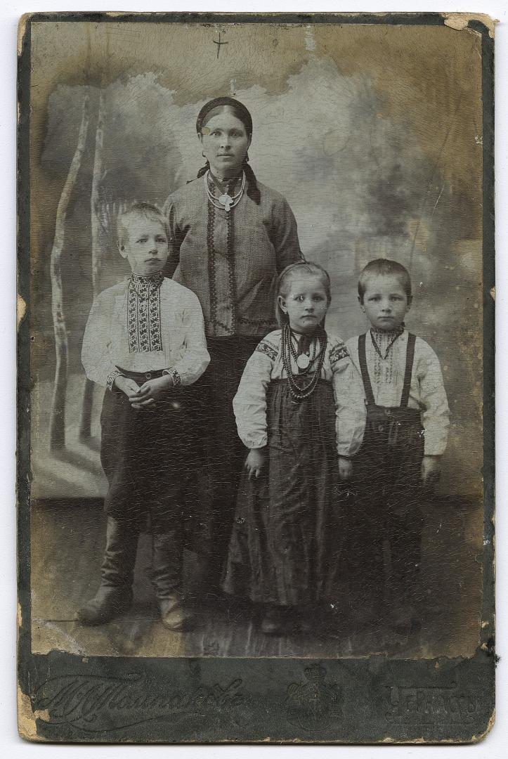 Woman with children in traditional attire