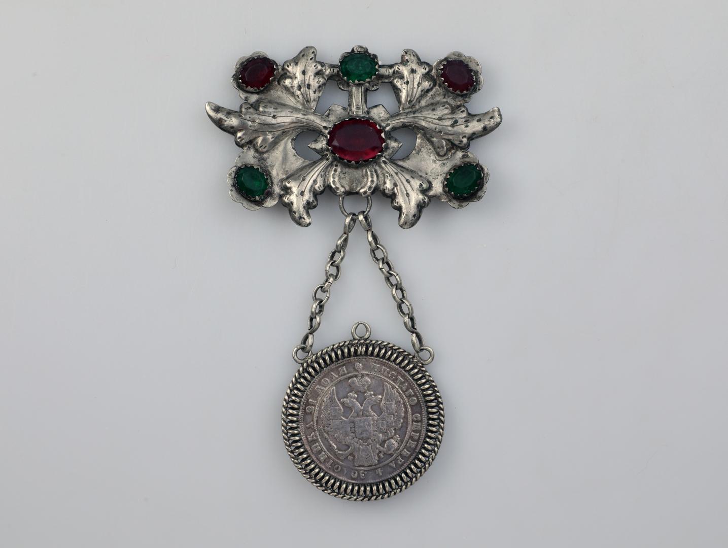 Large dukach (coin-shaped pendants) hung on a ribbon; worn as accessory