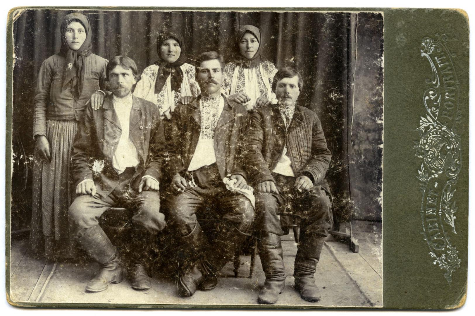 Photo. Men and women wearing folk attire