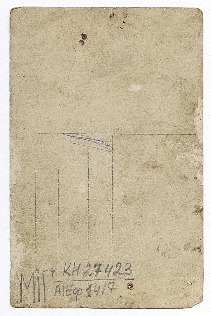 Three women wearing traditional jewelry