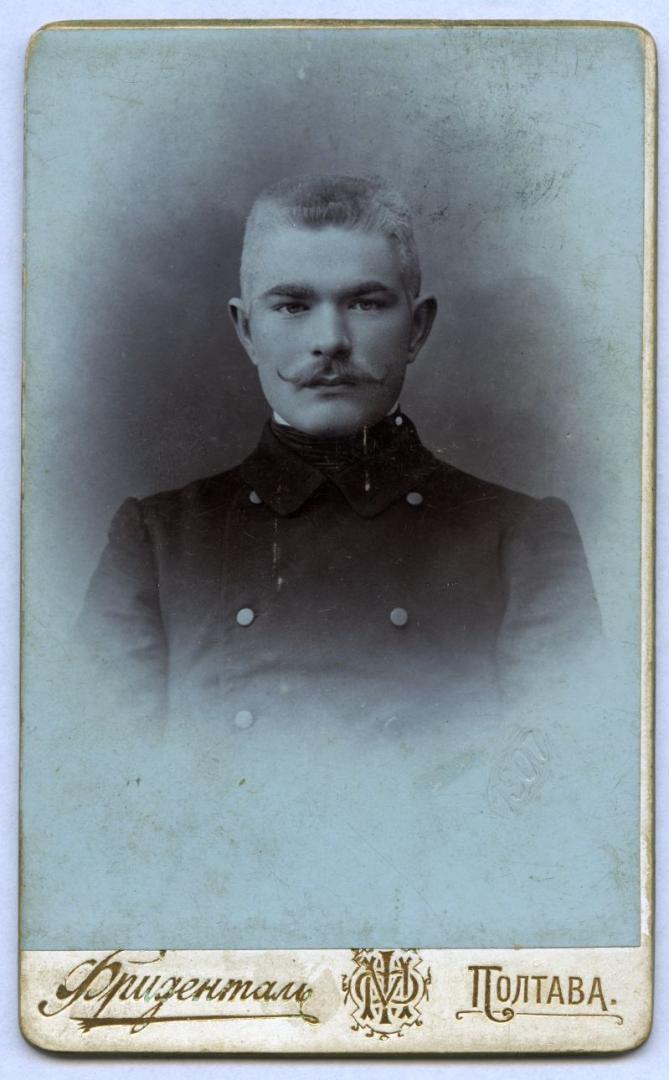 Photo. Portrait of a man with a mustache wearing a public official's uniform