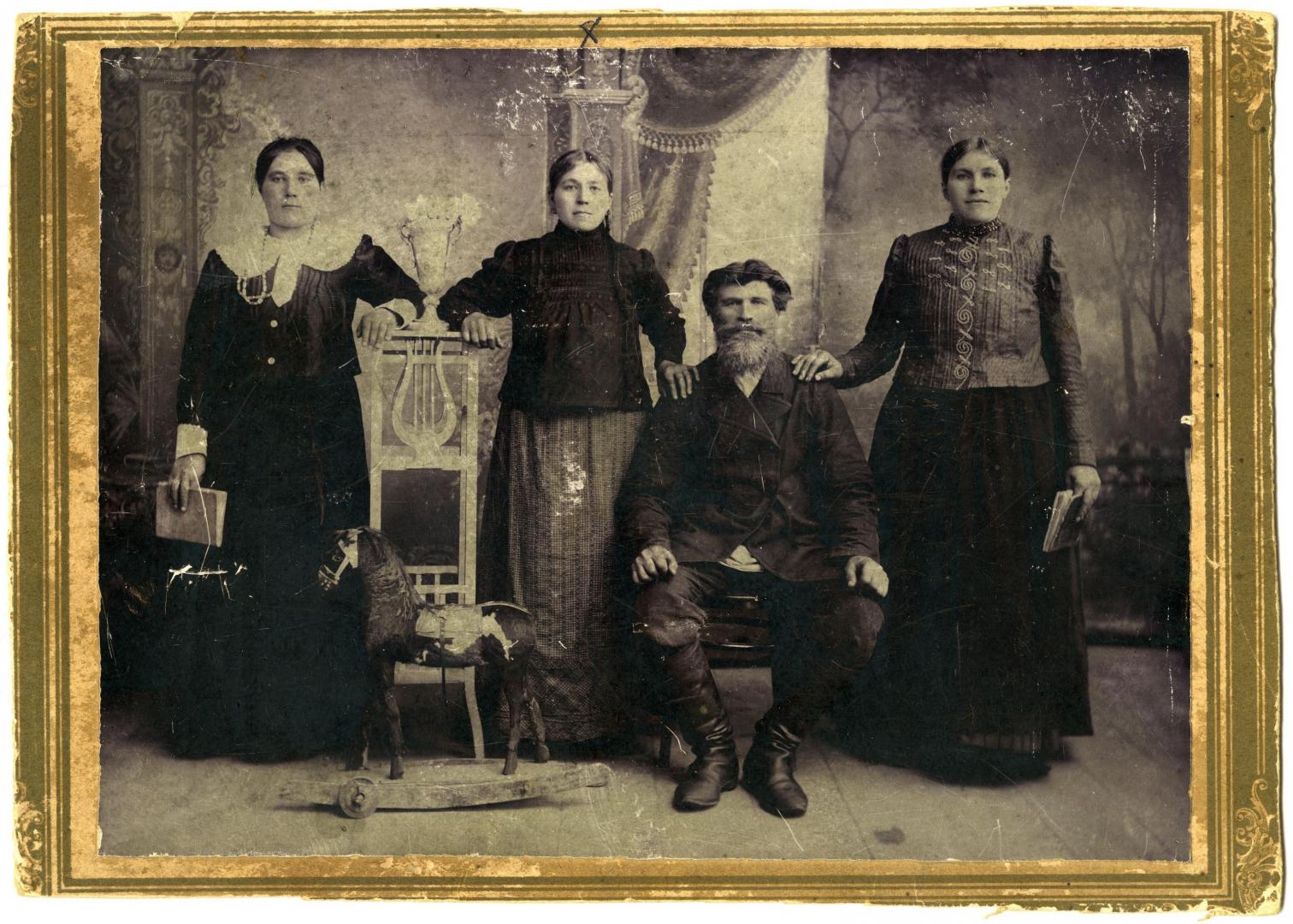 Photo. Petro Myroniv (great-grandfather of Antonina Ivanivna Garmash) with his daughters Anna, Paraska, and Uliana