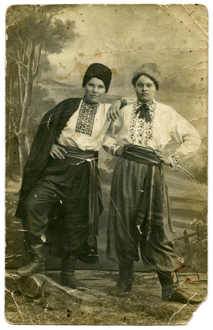 Photo. Two young men wearing stylised Ukrainian attire