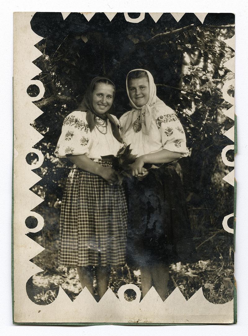 Two women in embroidered shirts