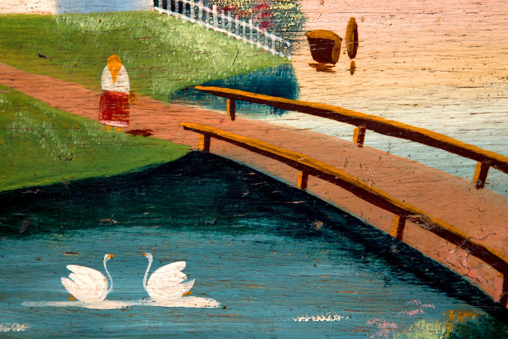 Rural landscape with a bridge and swans