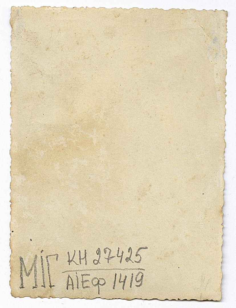 Woman in traditional attire and a boy