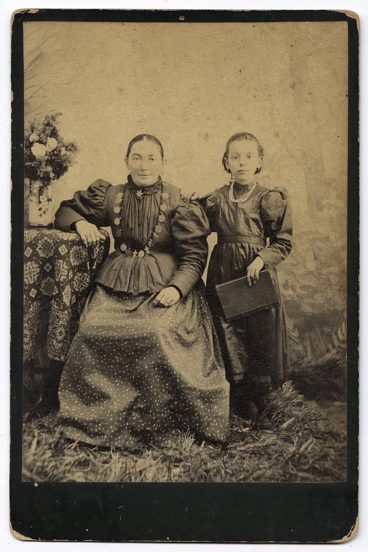 Woman and girl in bourgeois attire