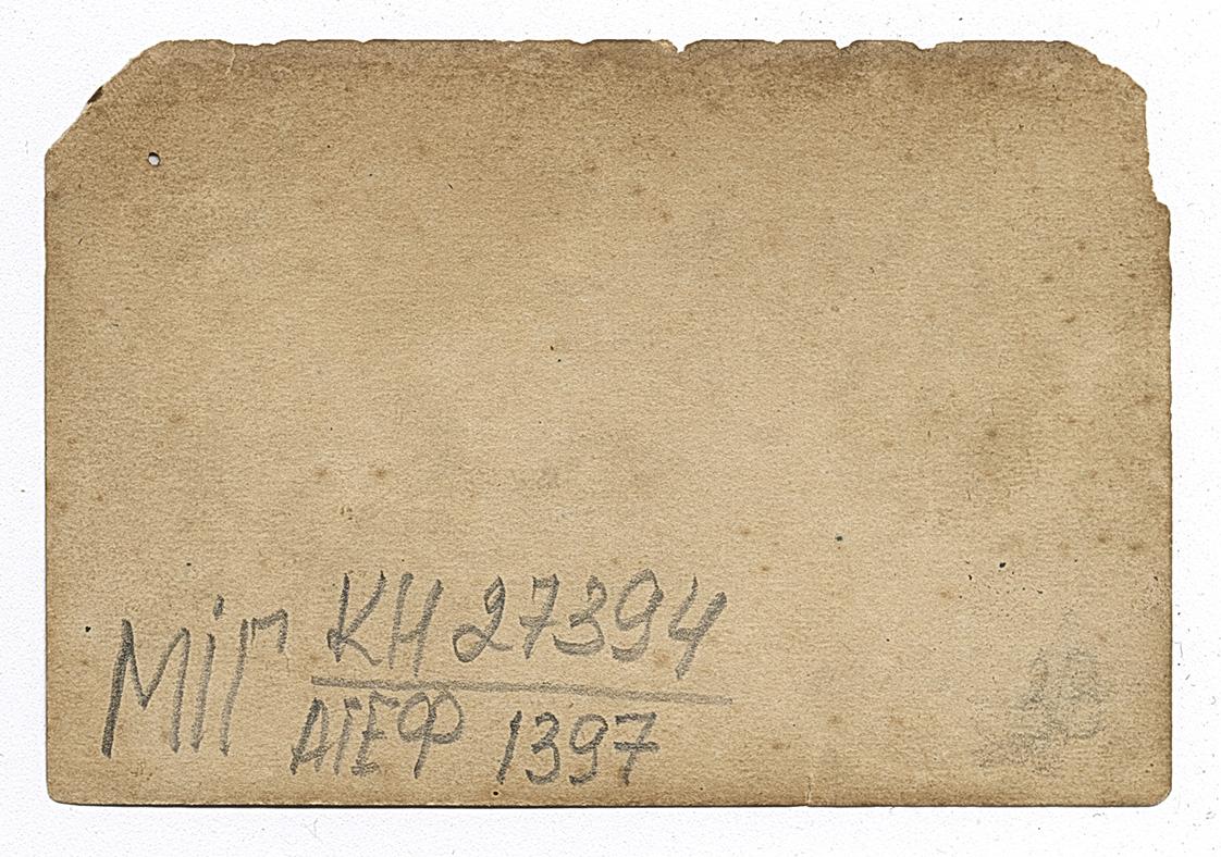 Three men on a crawler tractor