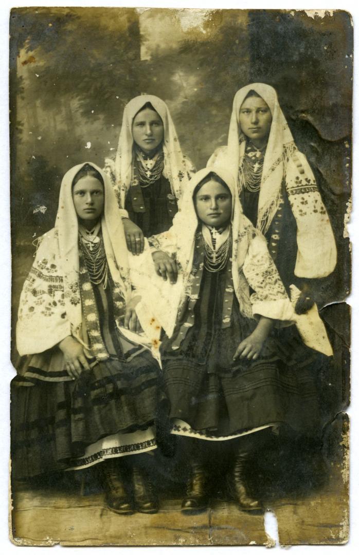 Photo. Young women wearing folk attire