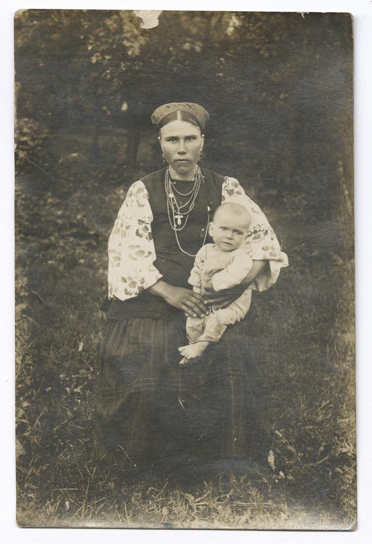 Woman in traditional attire and a child