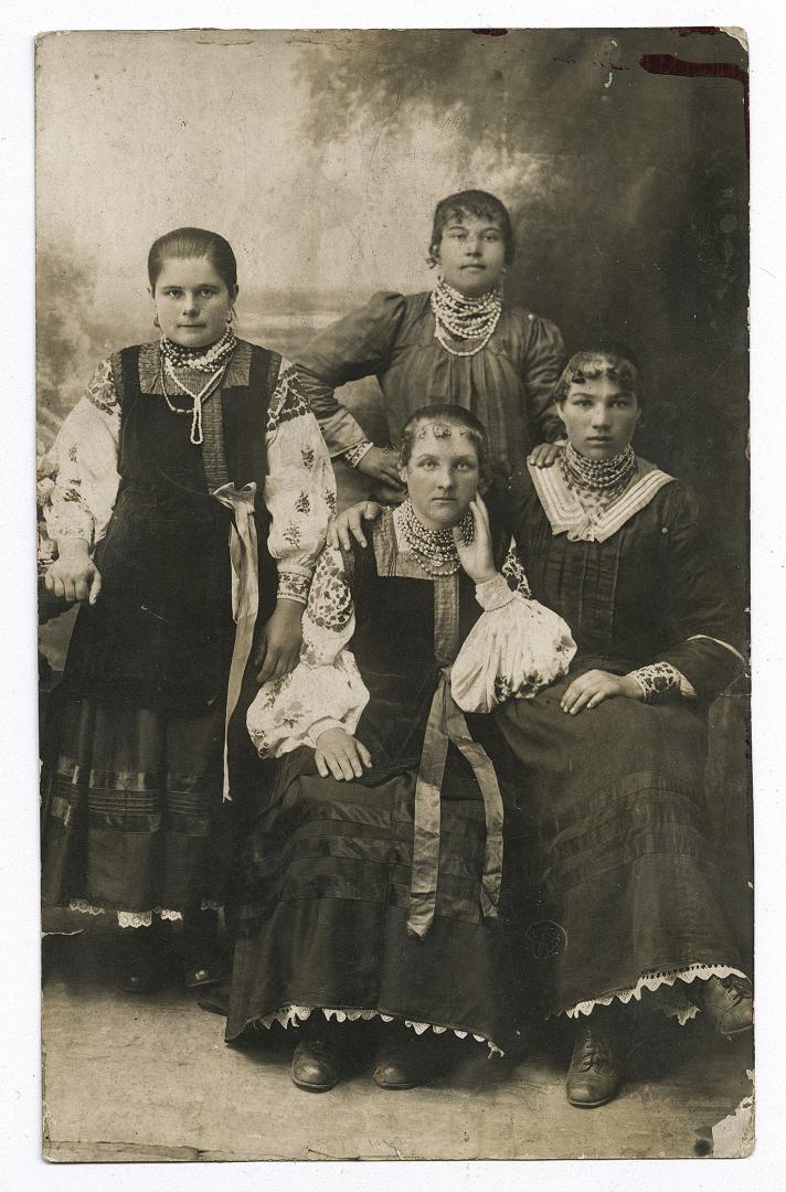 Group of girls, two in traditional attire