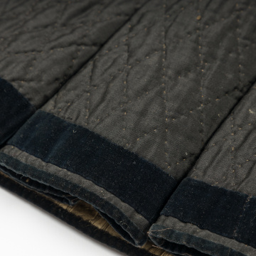 Yupka (quilted women's overocat) with rombus