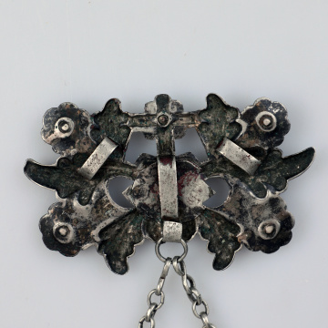 Large dukach (coin-shaped pendants) hung on a ribbon; worn as accessory