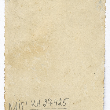 Woman in traditional attire and a boy