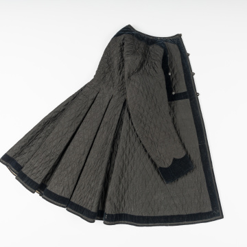 Yupka (quilted women's overocat) with rombus