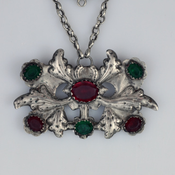 Large dukach (coin-shaped pendants) hung on a ribbon; worn as accessory